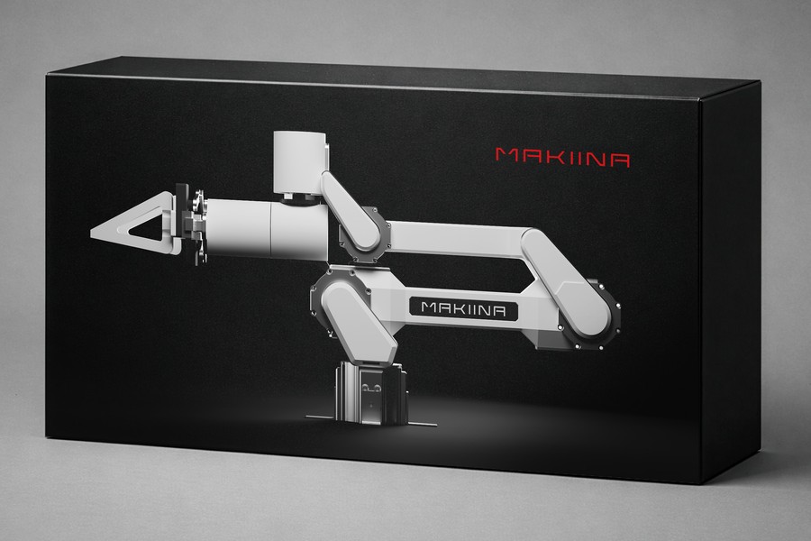 The MAKIINA arm in its shipping box